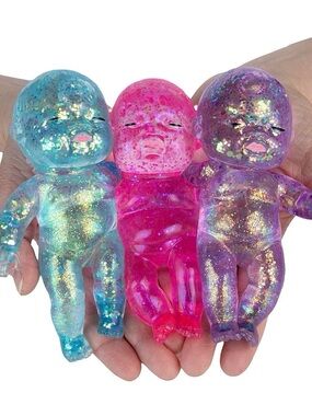 2X New Glitter & Gel Filled Squishy Babies